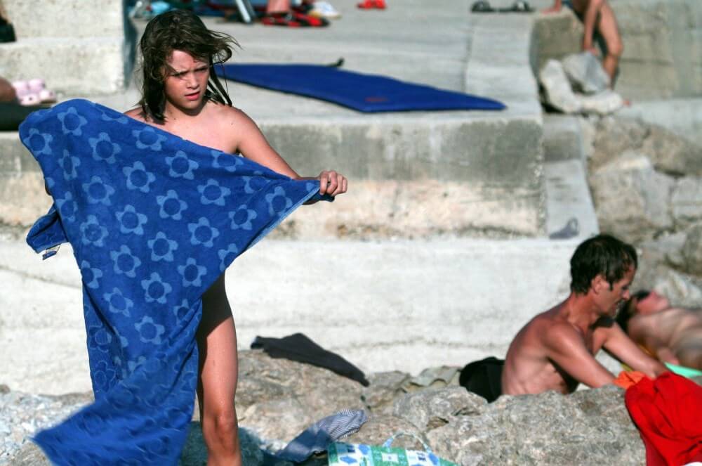 Nudist Rocky Family Angle - A nude person strives for inner harmony and peace of mind