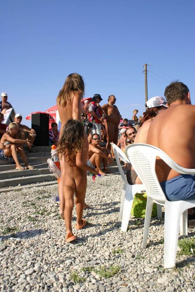 Naturist Standing Sideline - The idea of freedom and self-acceptance, as embodied by Adam and Eve, is important