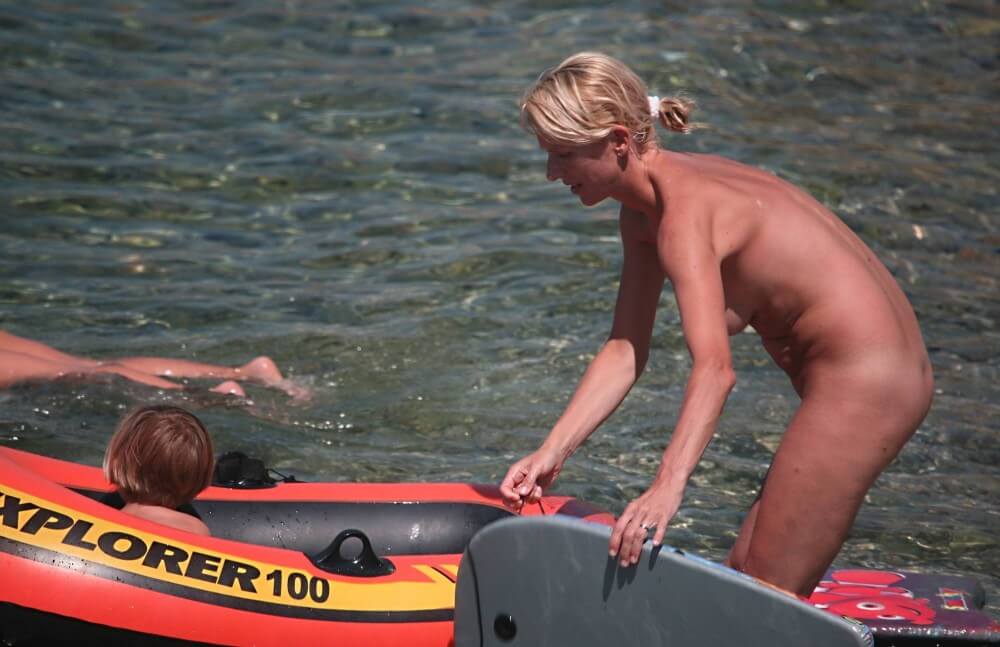 Red Boating for Two Nudists pics - Travel and tours incorporating elements of the naturist lifestyle