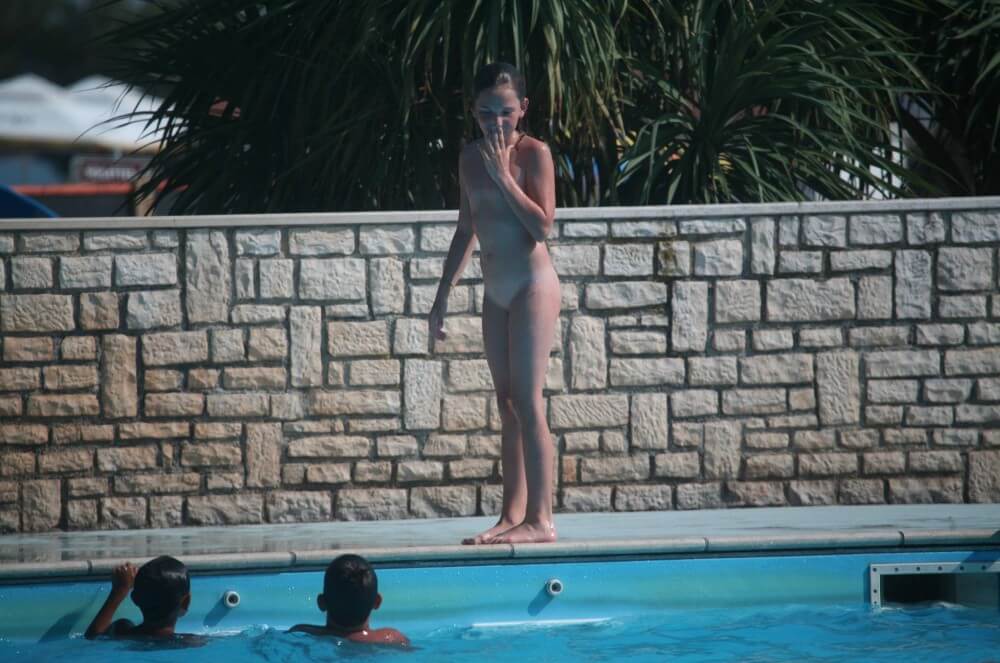 Naturist Pool-Side Singles photos - The practice of naturism fosters an atmosphere of trust and respect