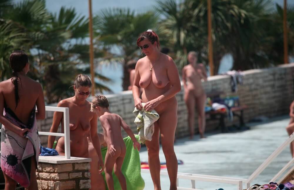 Boardwalk Biking pics - In nudism, people are equal to one another