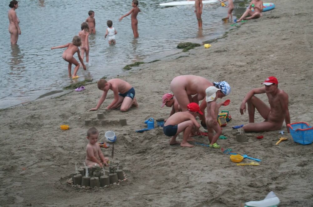 Nude Mom Nurture Series photos - Active naturists on vacation