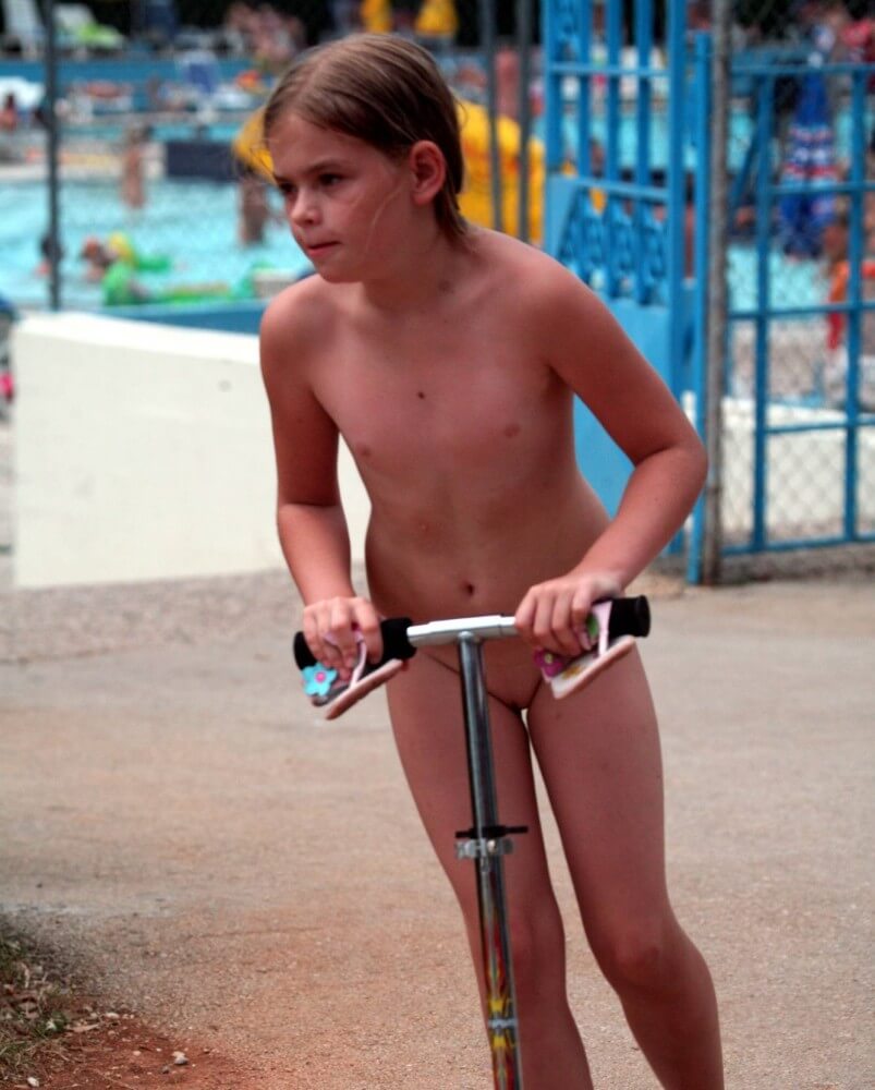 Pool-Side Naturist Scooter pics - Nudism helps us understand the true meaning of freedom
