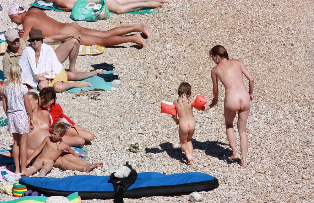 Orange Floaty Safety First Naturist pics - The Foundations of Naturist Philosophy and the Ethical Principles of the Community