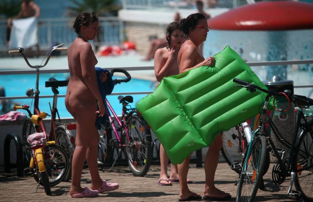 Outdoor Pool Sideliners pics - A nudist values inner balance and peace of mind